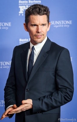 The dashing Ethan Hawke arrives on the red carpet to receive The American Riviera Award