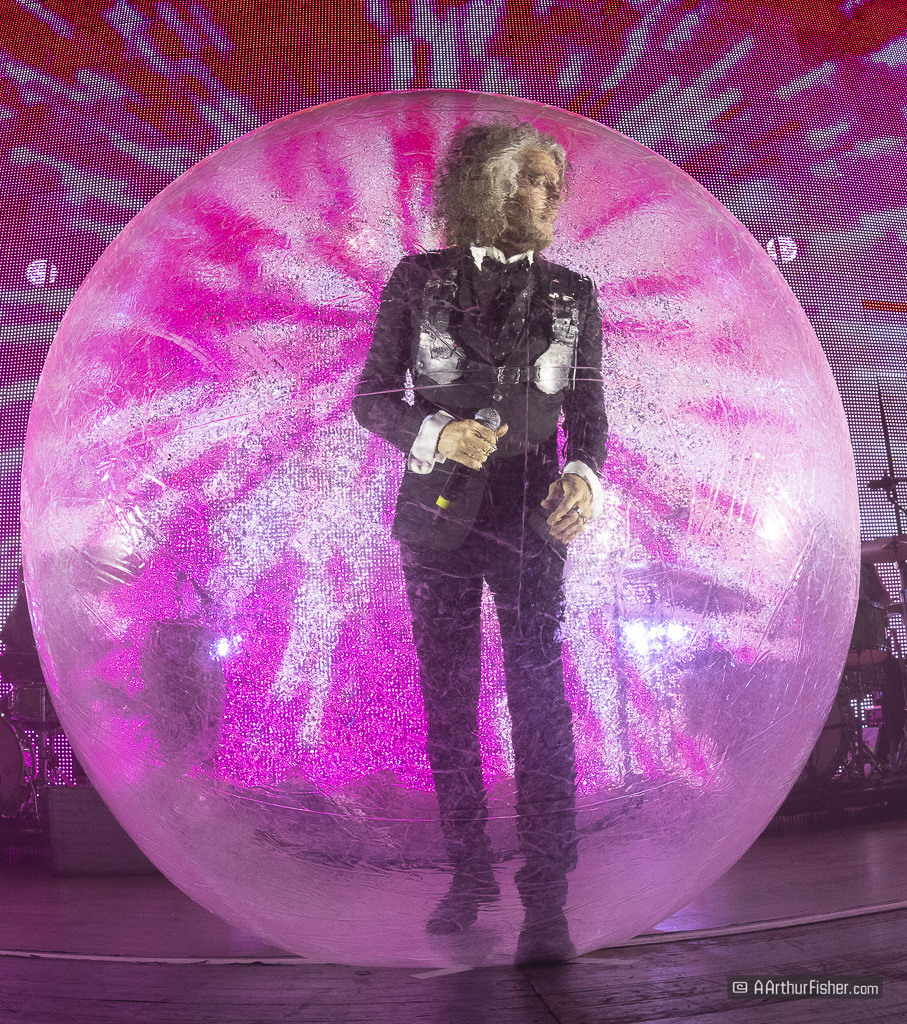 Wayne Coyne, lead singer for the Flaming Lips, on stage